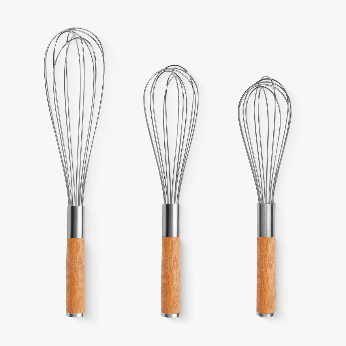 Schneebesen-Set Trio mit Griffen aus Eiche: 31 cm, 26,5 cm und 25 cm nebeneinander